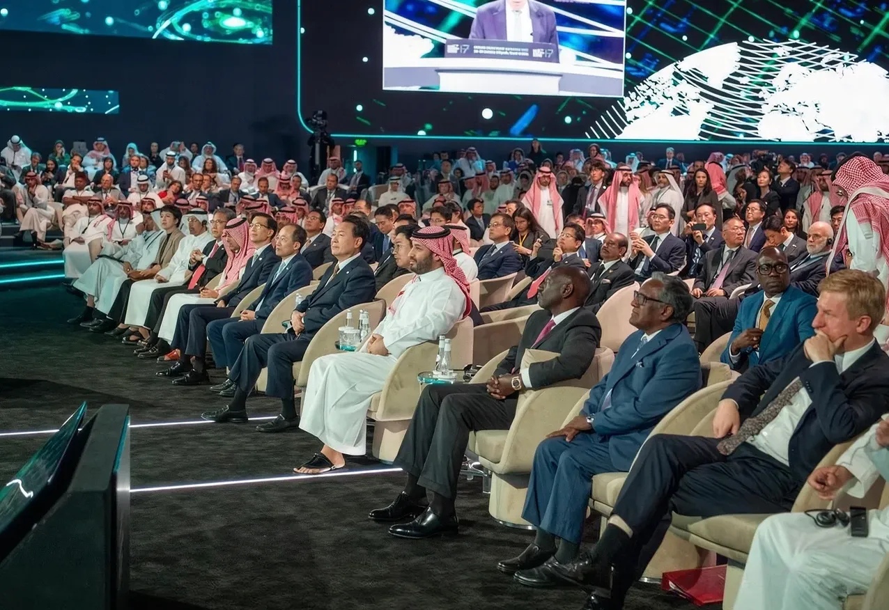 A packed conference hall facing the stage at LEAP 2025